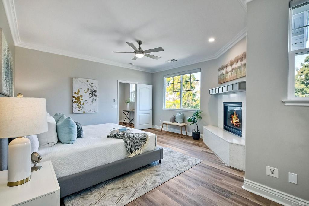 2559 Fire Mountain Drive Oceanside, CA 92054 - Photo 25 of 43 a bedroom with a bed couch and a window