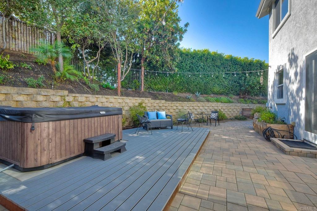 2559 Fire Mountain Drive Oceanside, CA 92054 - Photo 31 of 43 a view of a wooden deck with a yard