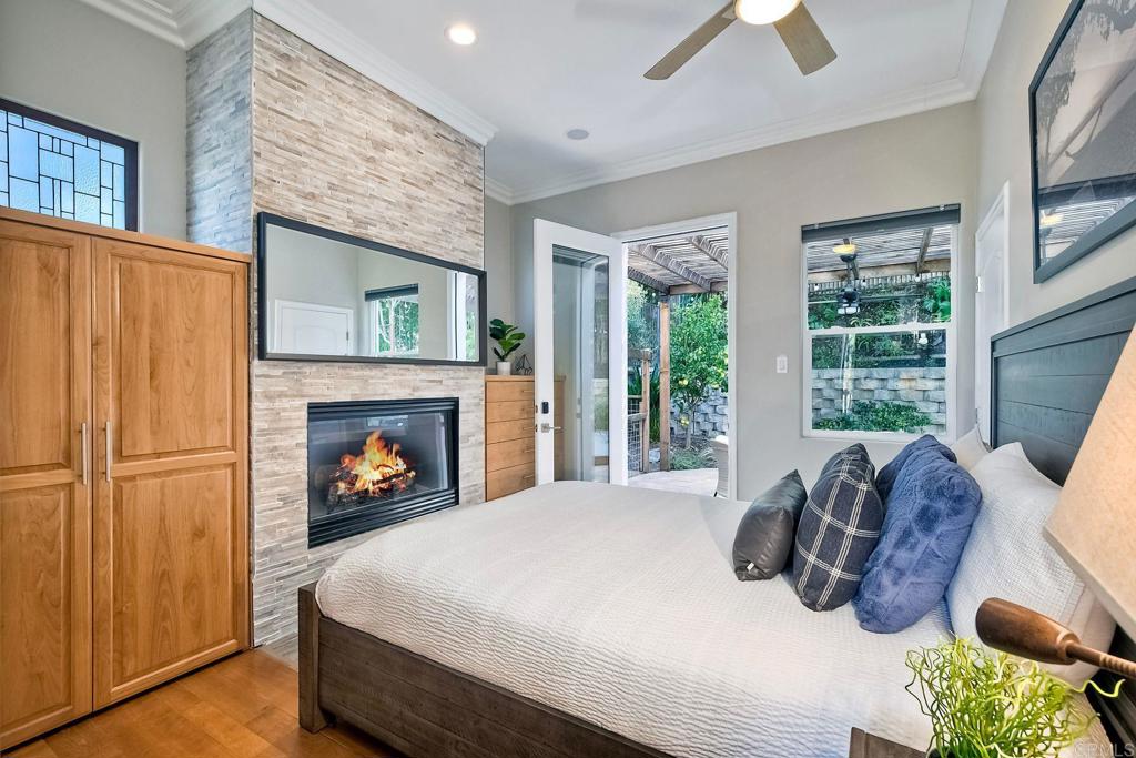 2559 Fire Mountain Drive Oceanside, CA 92054 - Photo 38 of 43 a bed sitting in a bedroom next to a window