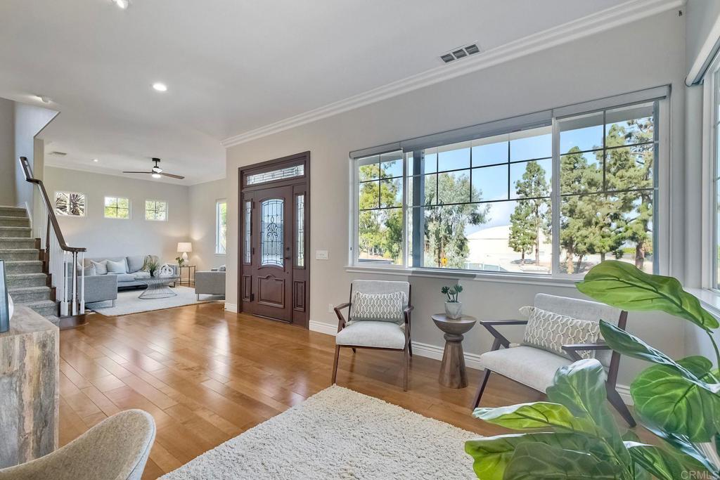 2559 Fire Mountain Drive Oceanside, CA 92054 - Photo 7 of 43 a living room with furniture and a large window