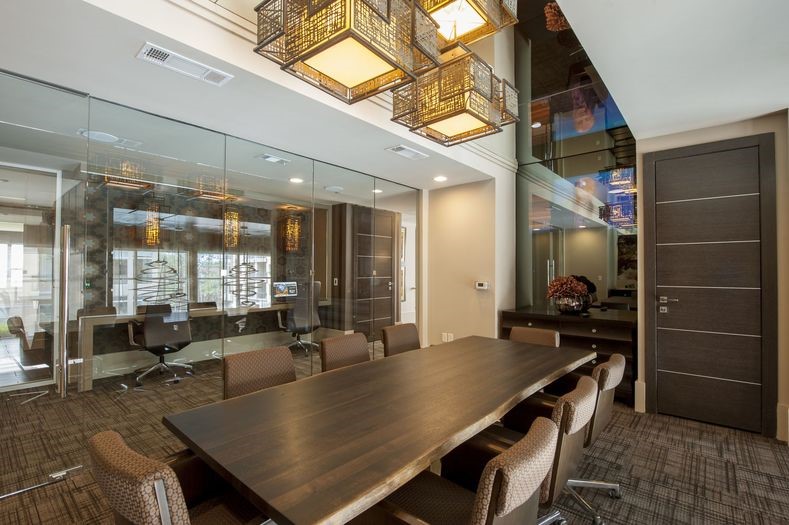 2111 Westheimer Road, Unit 1401 Houston, TX 77098 - Photo 12 of 16 a dining room with glass top table and chairs