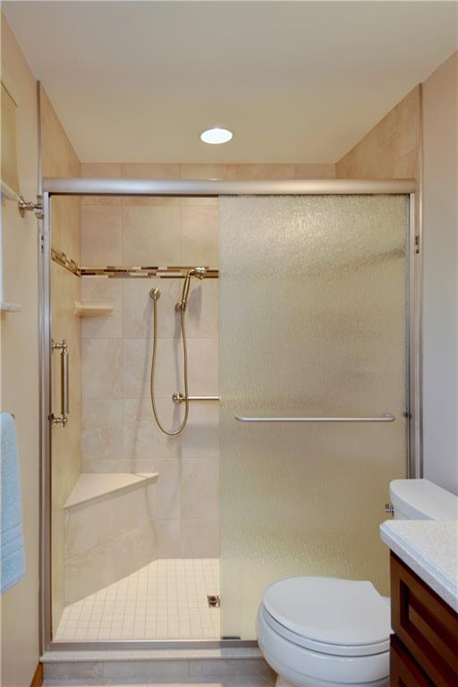 413 Thompson Run Road Pittsburgh, PA 15237 - Photo 18 of 25 a bathroom with a shower a toilet and a shower