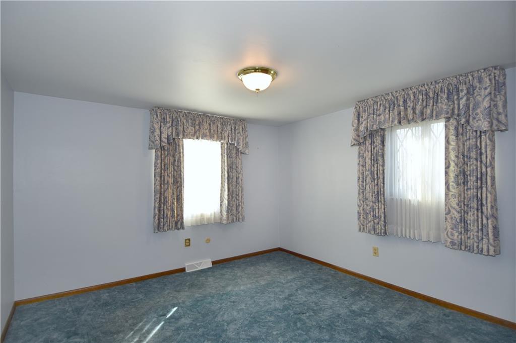 413 Thompson Run Road Pittsburgh, PA 15237 - Photo 20 of 25 an empty room with window and mirror
