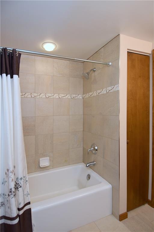 413 Thompson Run Road Pittsburgh, PA 15237 - Photo 21 of 25 a bathroom with a bathtub and a shower