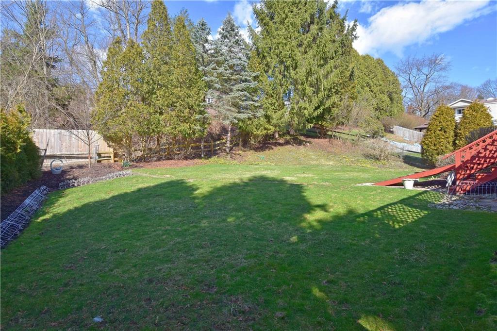 413 Thompson Run Road Pittsburgh, PA 15237 - Photo 3 of 25 a backyard of a house with lots of green space