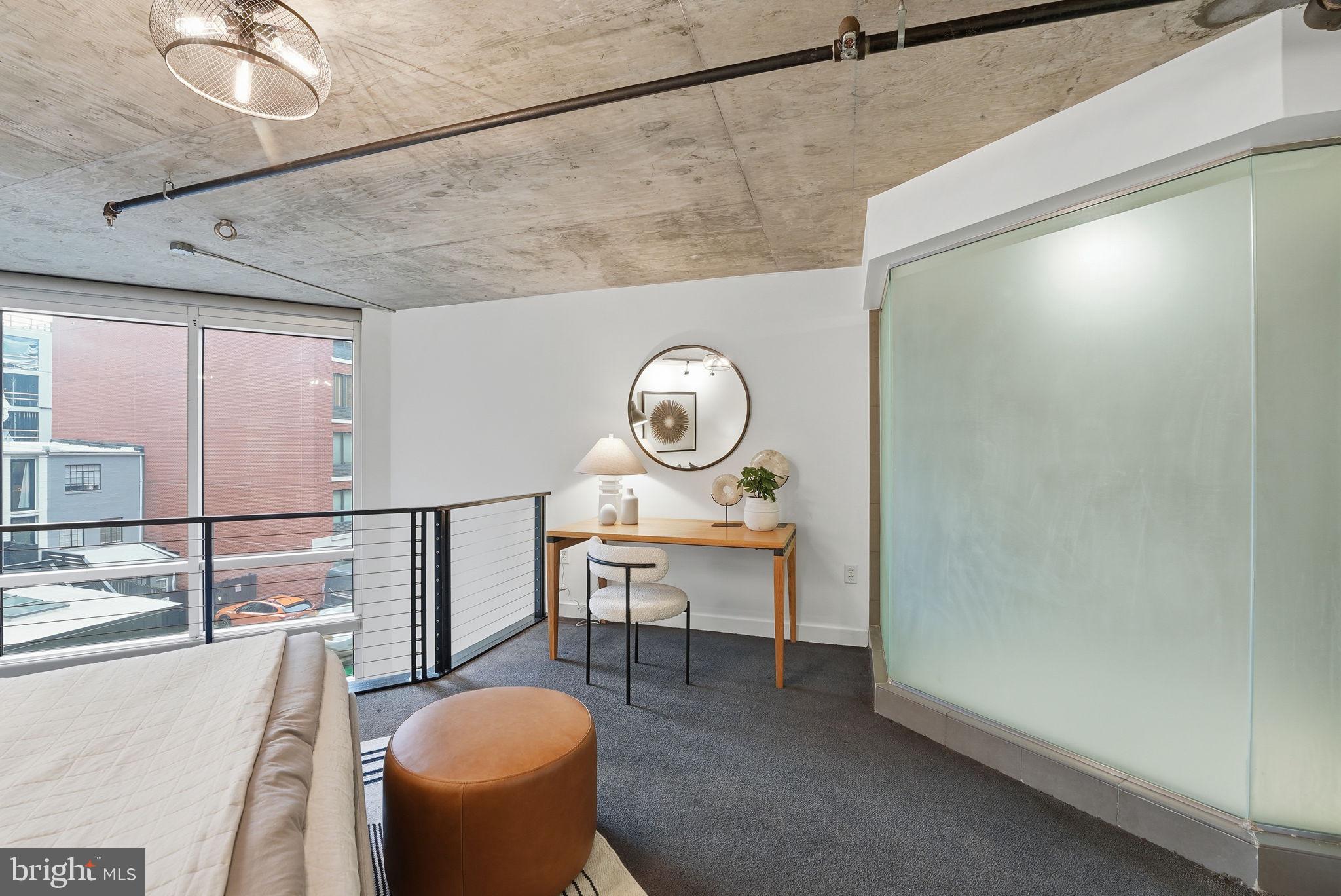 1515 15th Street Northwest, Unit 234 Washington, DC 20005 - Photo 14 of 33 a view of a chairs and a table in a room