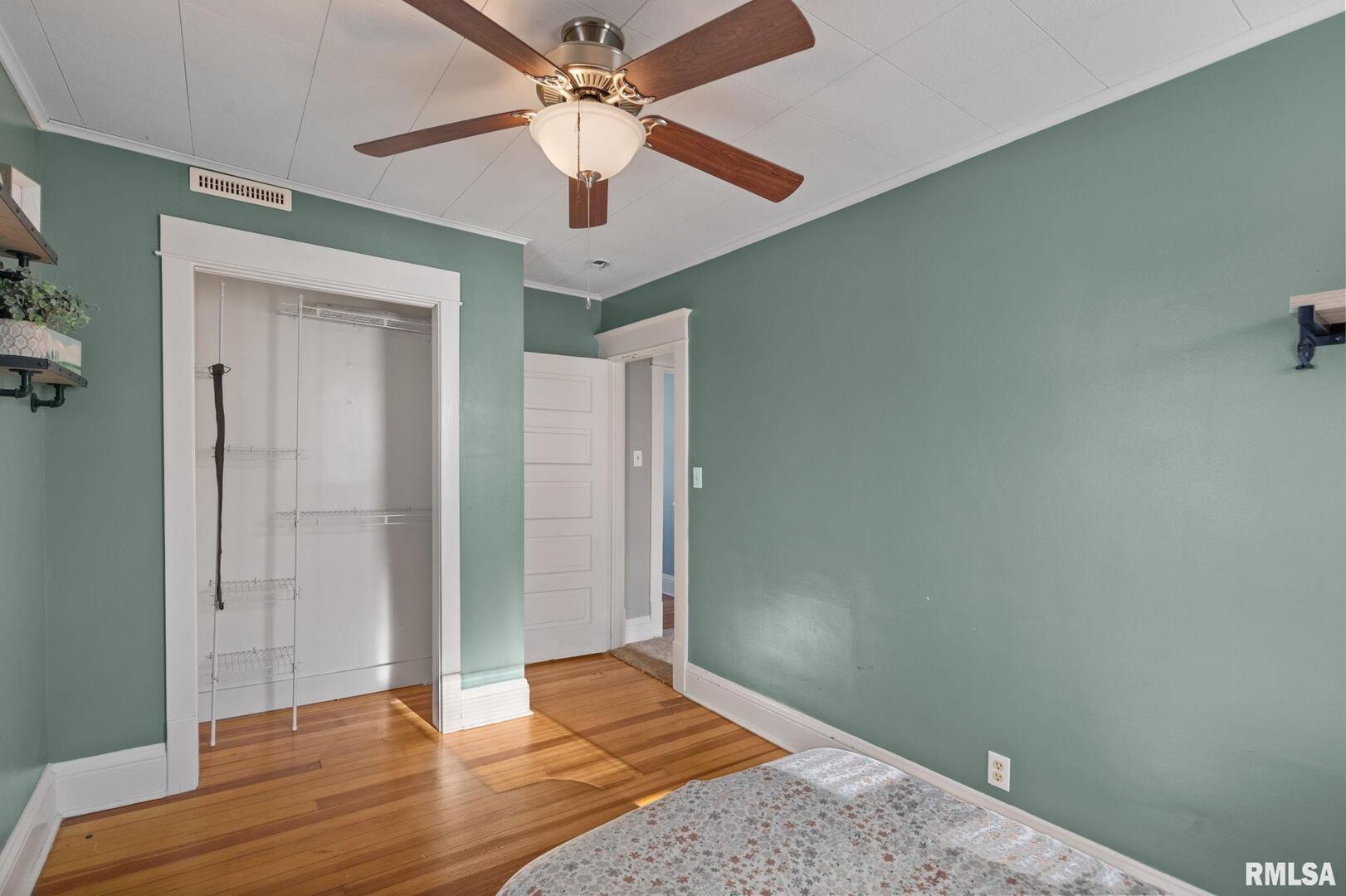 1602 37th Street Rock Island, IL 61201 - Photo 17 of 37 wooden floor in an empty room