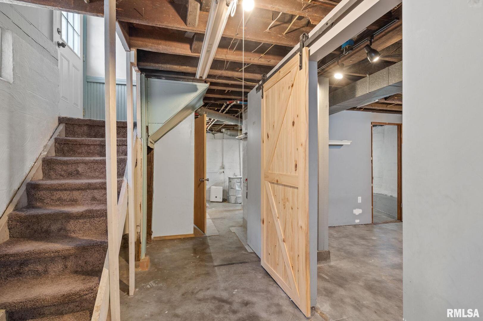 1602 37th Street Rock Island, IL 61201 - Photo 22 of 37 a view of an entryway with staircase