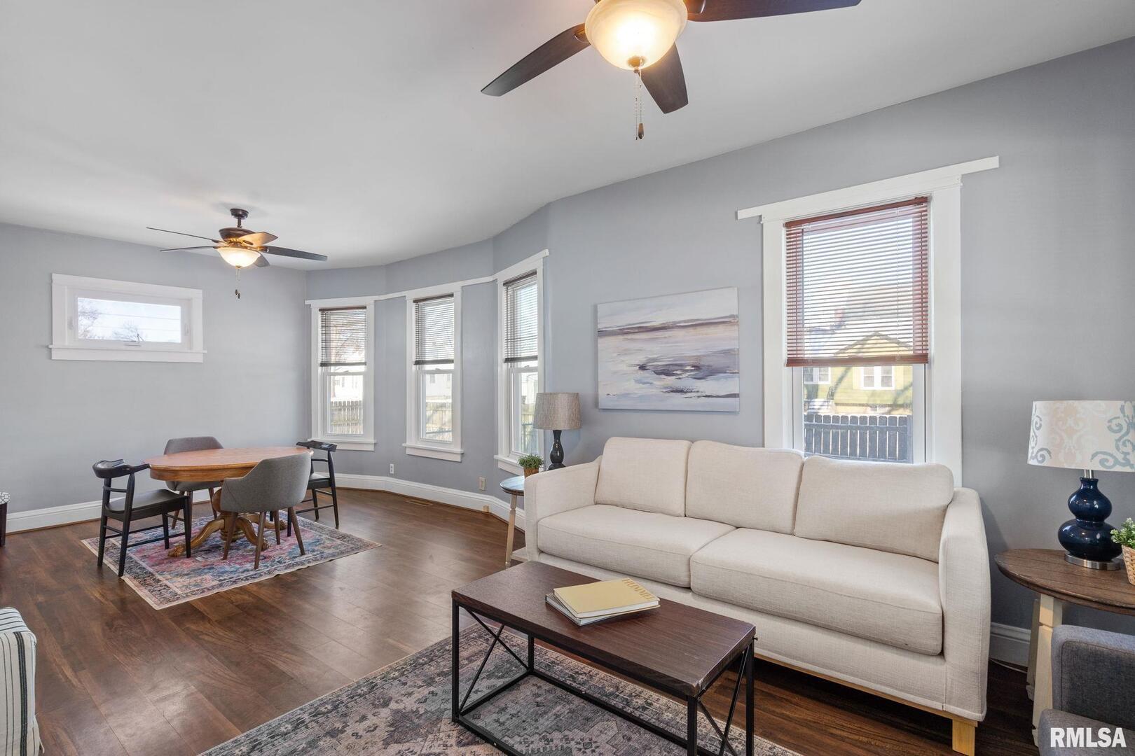 1602 37th Street Rock Island, IL 61201 - Photo 4 of 37 a living room with furniture and wooden floor