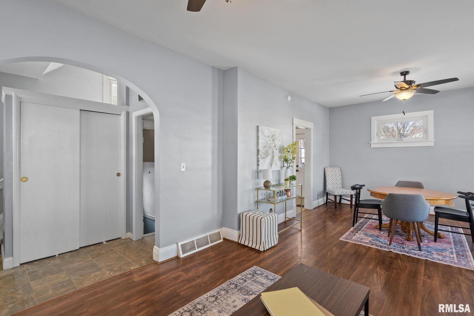 1602 37th Street Rock Island, IL 61201 - Photo 5 of 37 a view of a livingroom with furniture and wooden floor