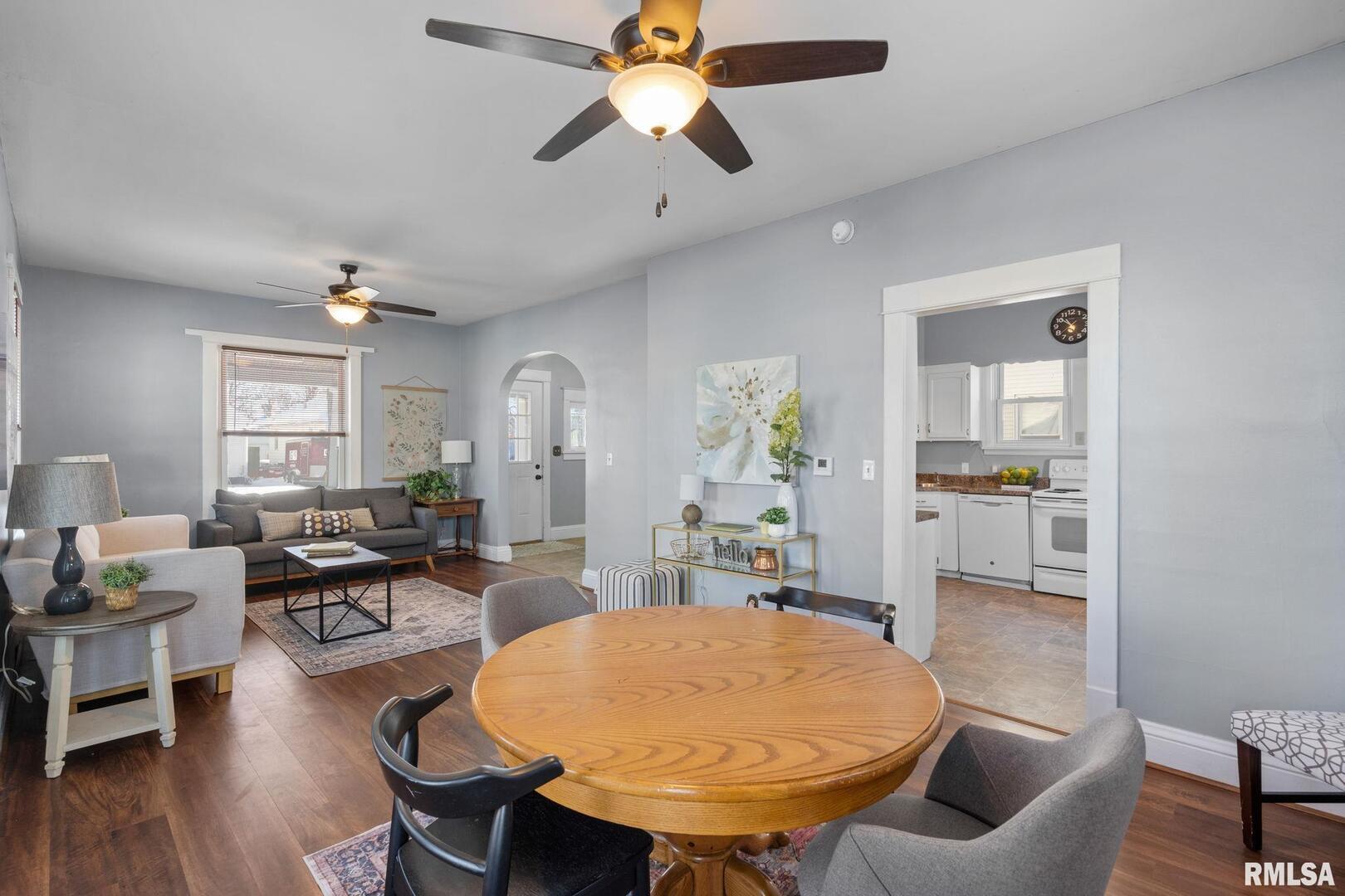 1602 37th Street Rock Island, IL 61201 - Photo 6 of 37 a living room with furniture and a table