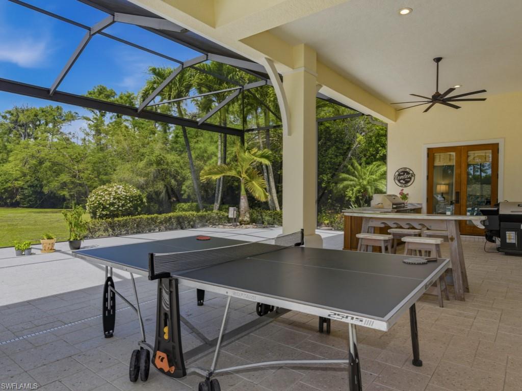 7051 Hunters Road Naples, FL 34109 - Photo 36 of 49 a view of a dining room with furniture window and outside view