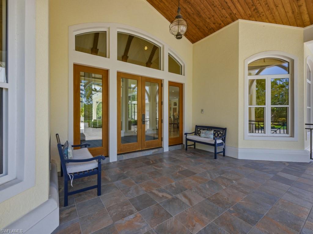 7051 Hunters Road Naples, FL 34109 - Photo 6 of 49 a view of a entryway with a livingroom