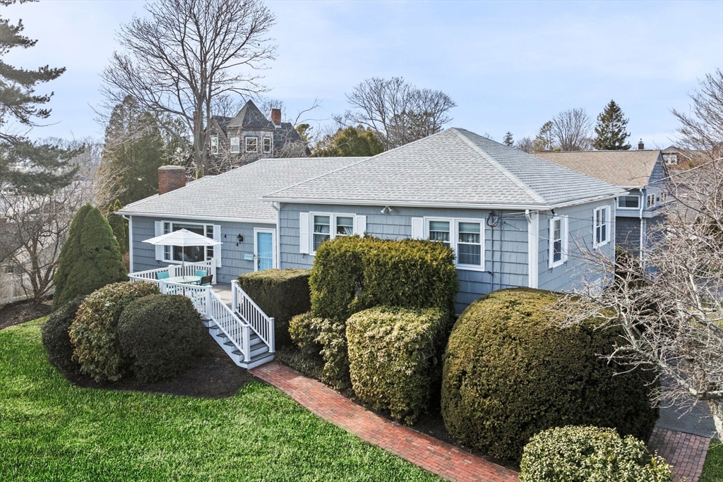 19-21 Cleveland Road Marblehead, MA 01945 - Photo 3 of 35 a front view of house with yard and green space