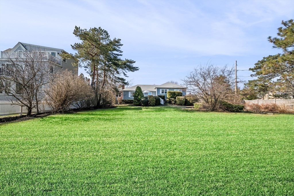 19-21 Cleveland Road Marblehead, MA 01945 - Photo 4 of 35 a view of yard with swimming pool and green space