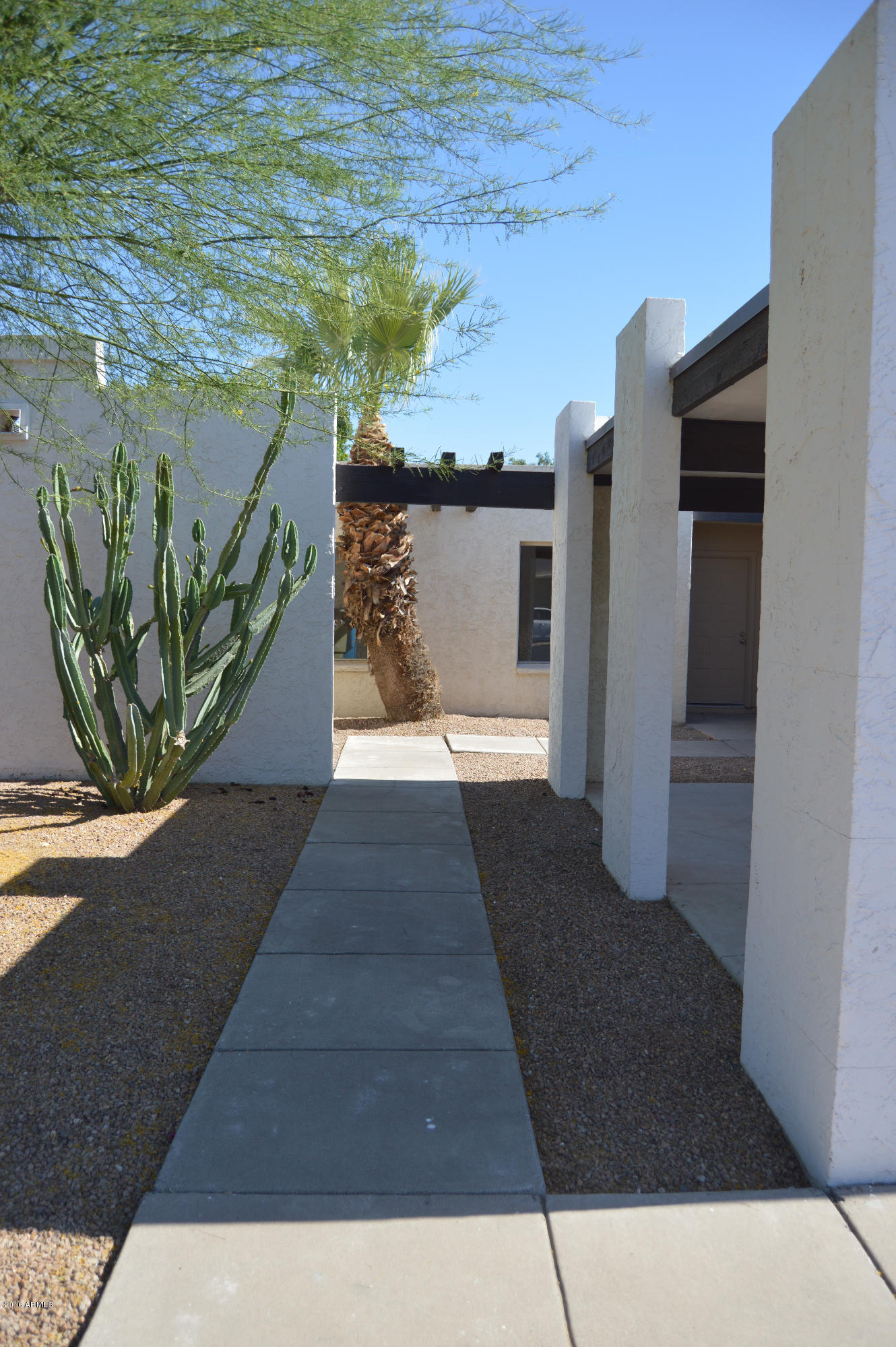 3029 West Redfield Road Phoenix, AZ 85053 - Photo 3 of 21 a view of a entryway door of the house