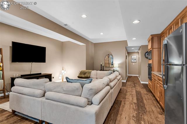 182 Raptor Court Canon City, CO 81212 - Photo 24 of 50 The large open space of this family room makes it very easy to navigate to the bedroom, bathroom, and utility closet on the back side of the hallway pictured here.