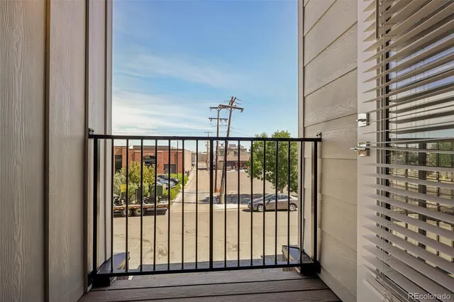 a view of a chairs on the balcony