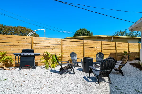 a view of a terrace with furniture and sitting area