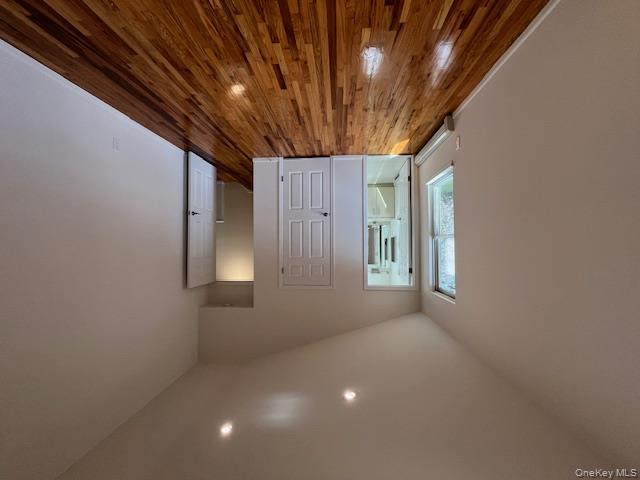 25 South Norwood Road, Unit LEFT Port Washington, NY 11050 - Photo 11 of 19 a view of livingroom with wooden floor