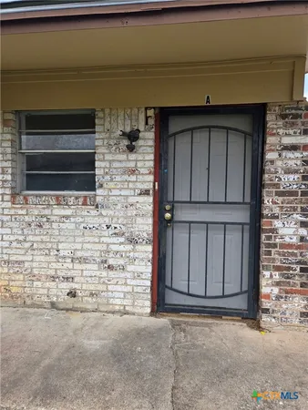 a front view of a house with garage