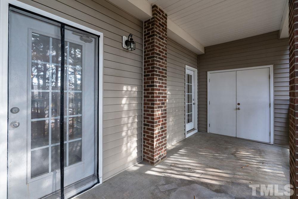 7022 Sandy Forks Road, Unit 201 Raleigh, NC 27615 - Photo 28 of 30 a view of entryway door