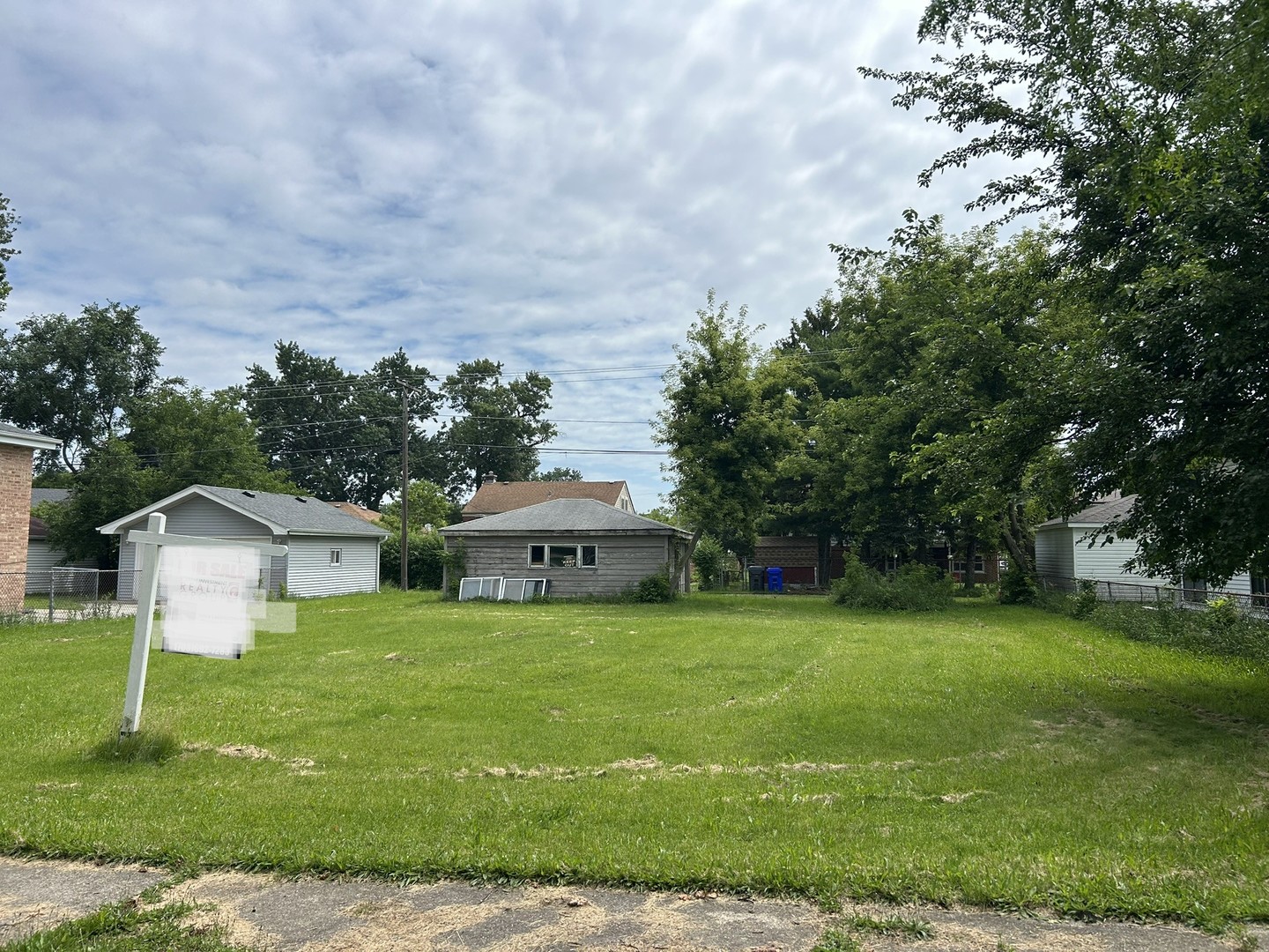 a house view with a garden space