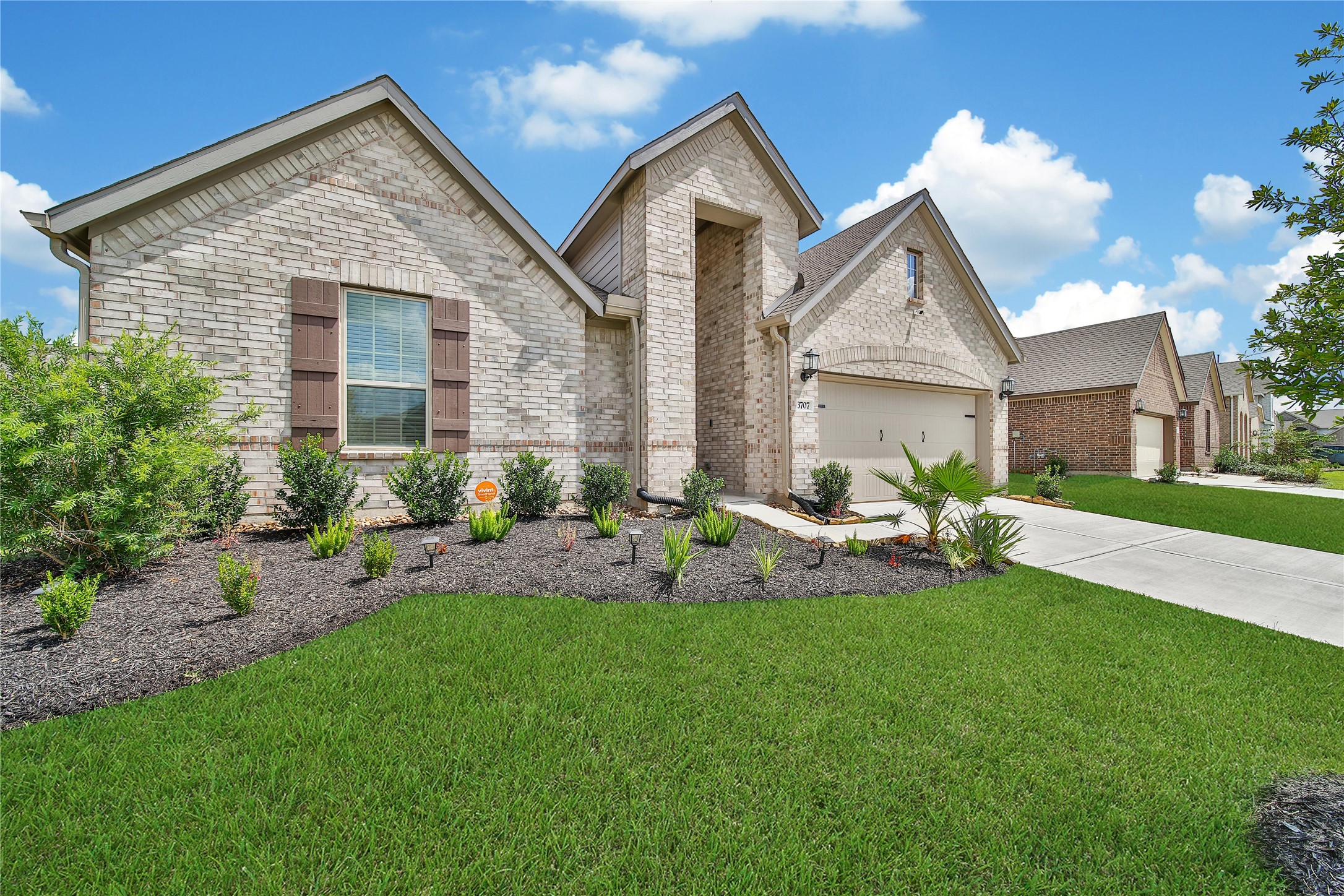 3707 Meadow Breeze Lane Rosenberg, TX 77469 - Photo 2 of 30 a front view of a house with a yard and porch