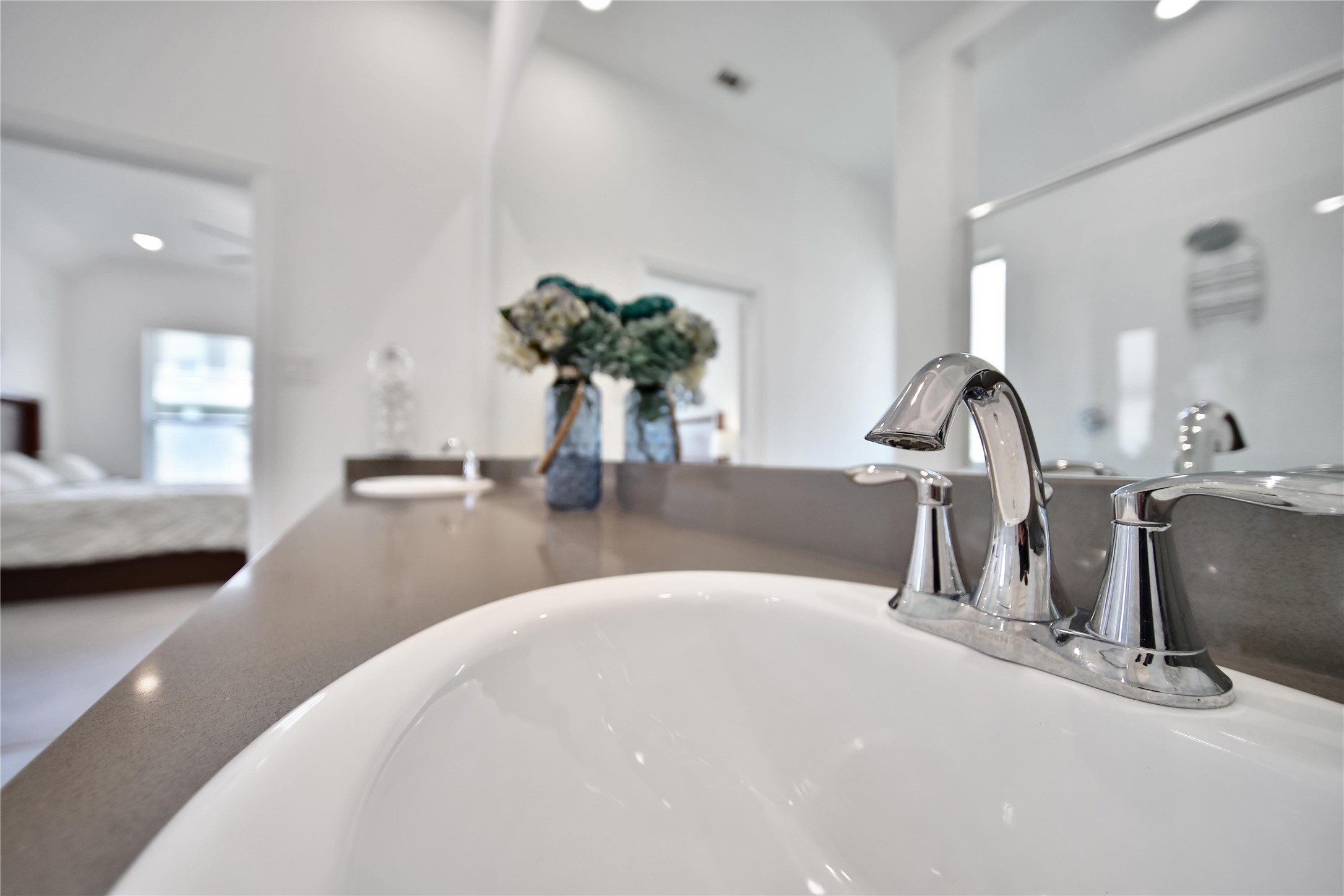 3707 Meadow Breeze Lane Rosenberg, TX 77469 - Photo 23 of 30 a kitchen with a faucet a sink and a wooden floor