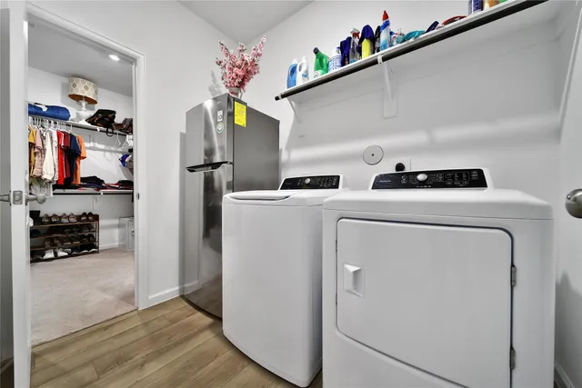 a utility room with dryer and washer