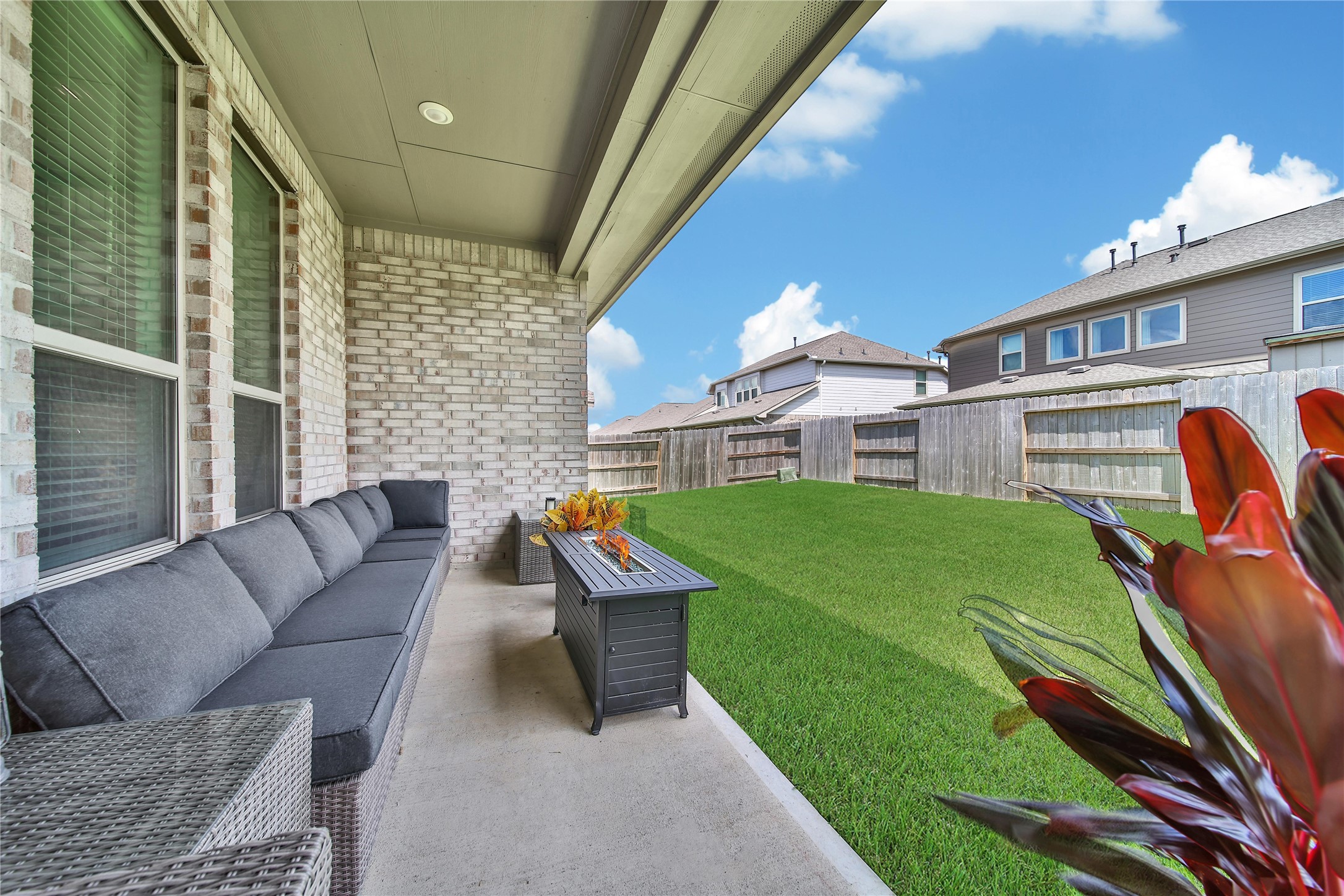 3707 Meadow Breeze Lane Rosenberg, TX 77469 - Photo 26 of 30 a balcony with furniture and a yard