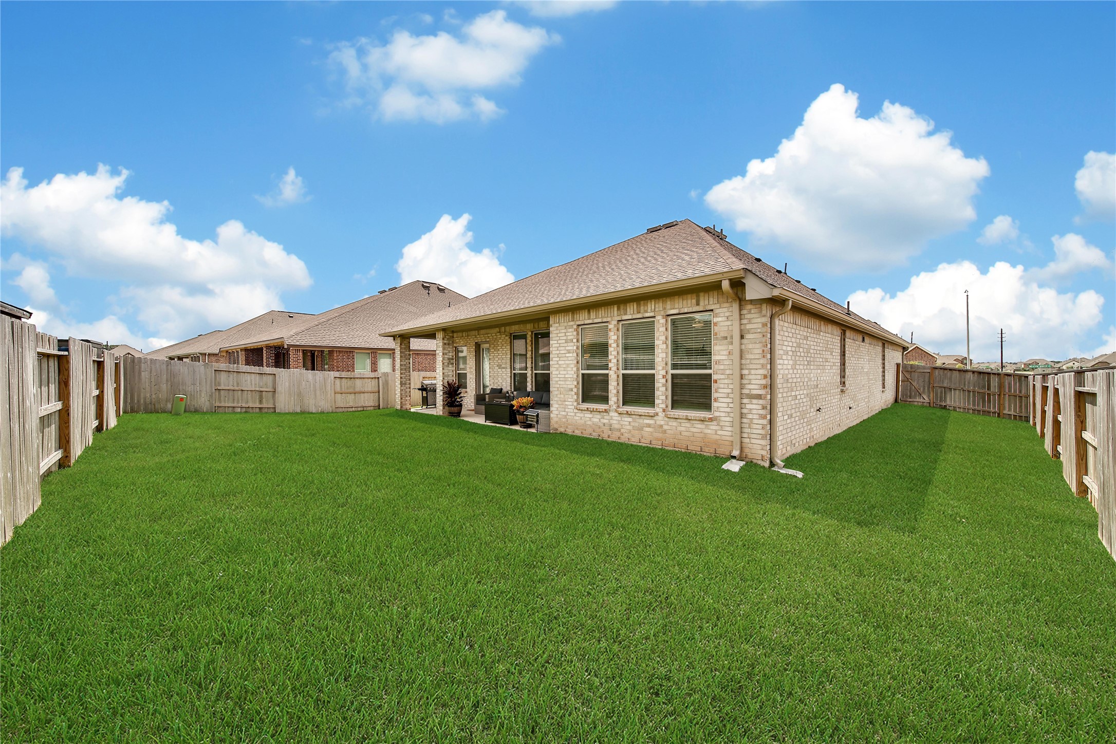 3707 Meadow Breeze Lane Rosenberg, TX 77469 - Photo 27 of 30 a view of a house with a backyard
