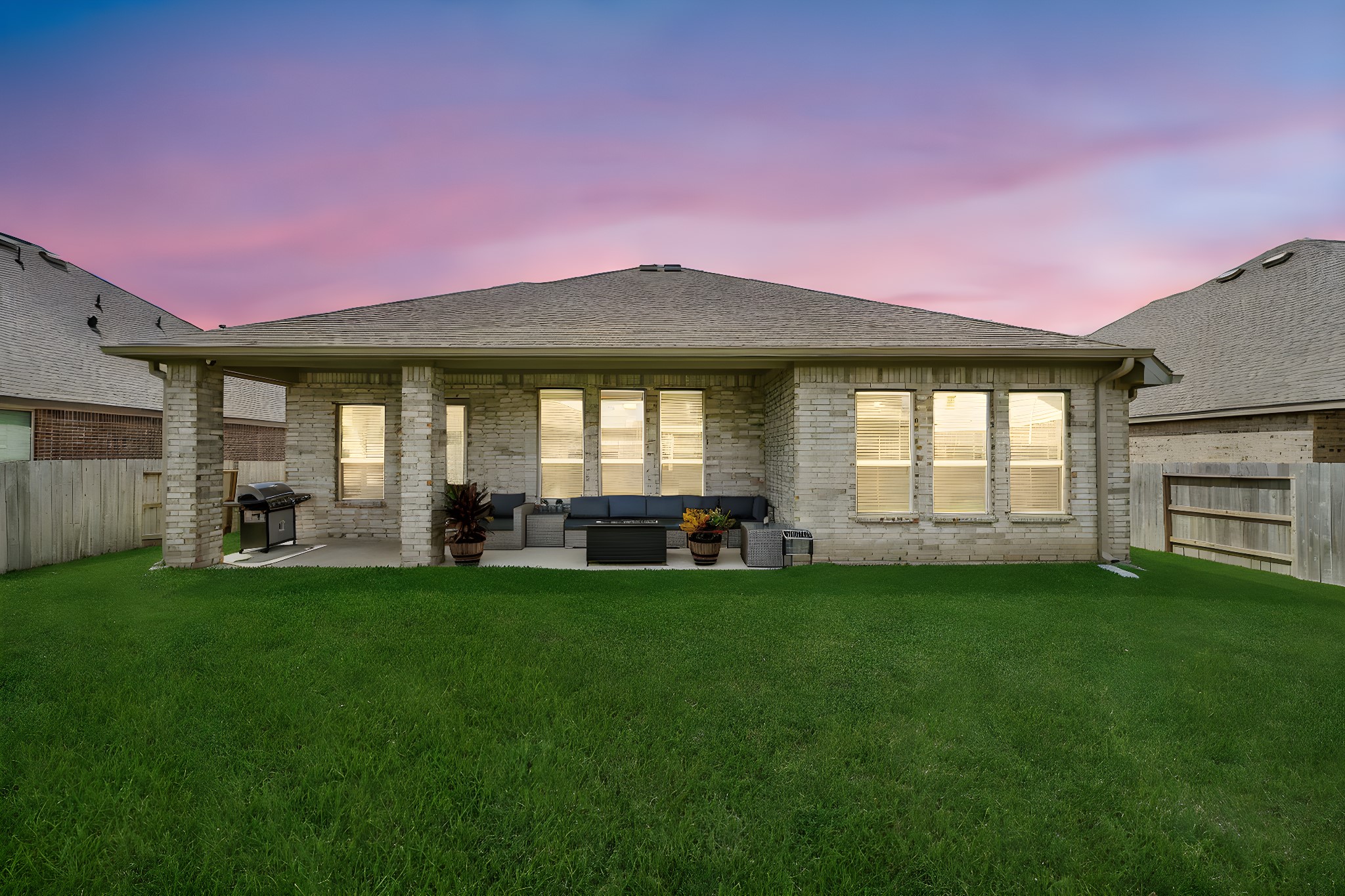 3707 Meadow Breeze Lane Rosenberg, TX 77469 - Photo 29 of 30 a view of a house with a backyard and porch