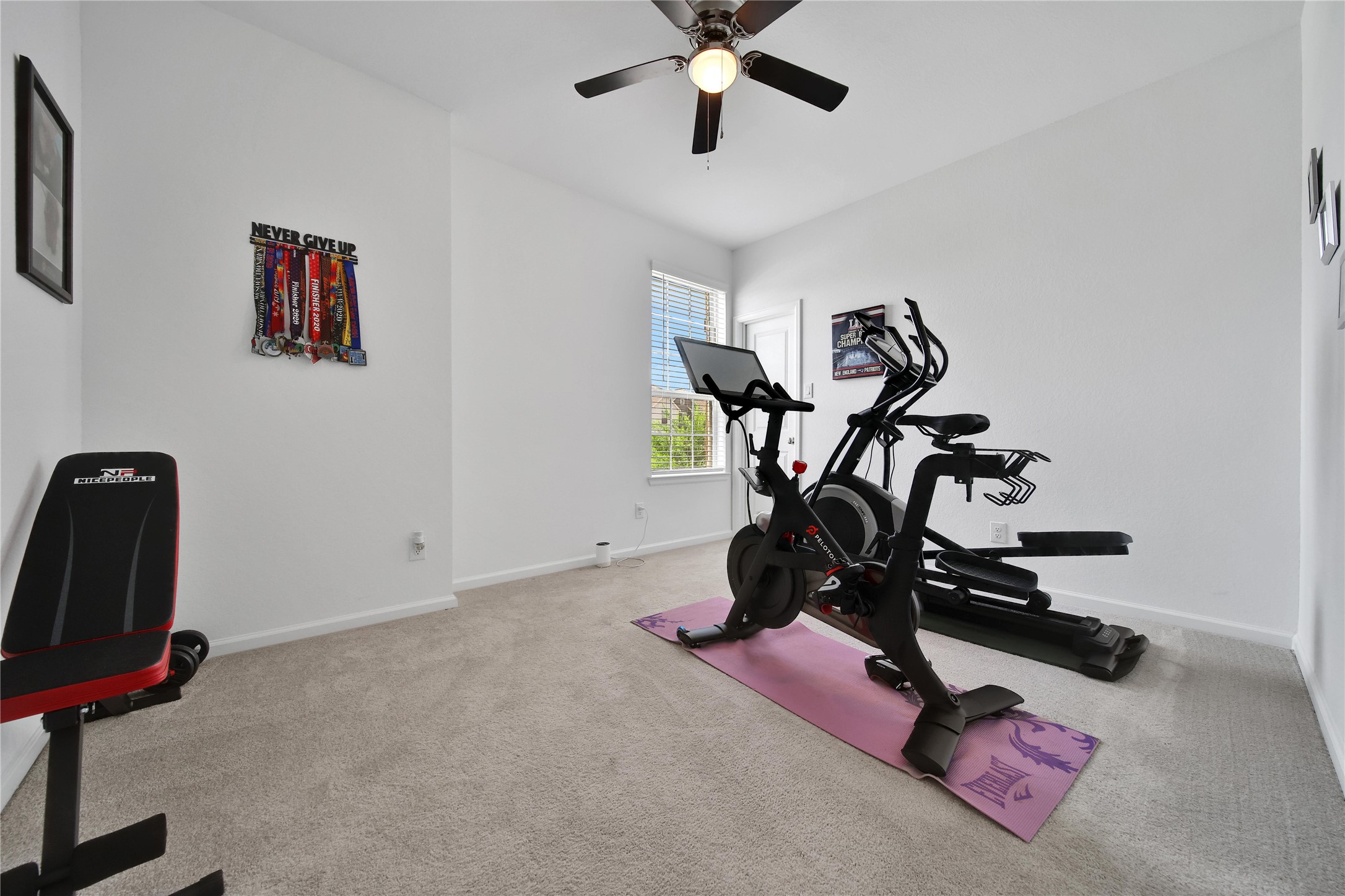 3707 Meadow Breeze Lane Rosenberg, TX 77469 - Photo 9 of 30 a view of a room with gym equipment
