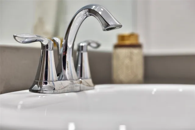 a view of a hall with a wooden floor