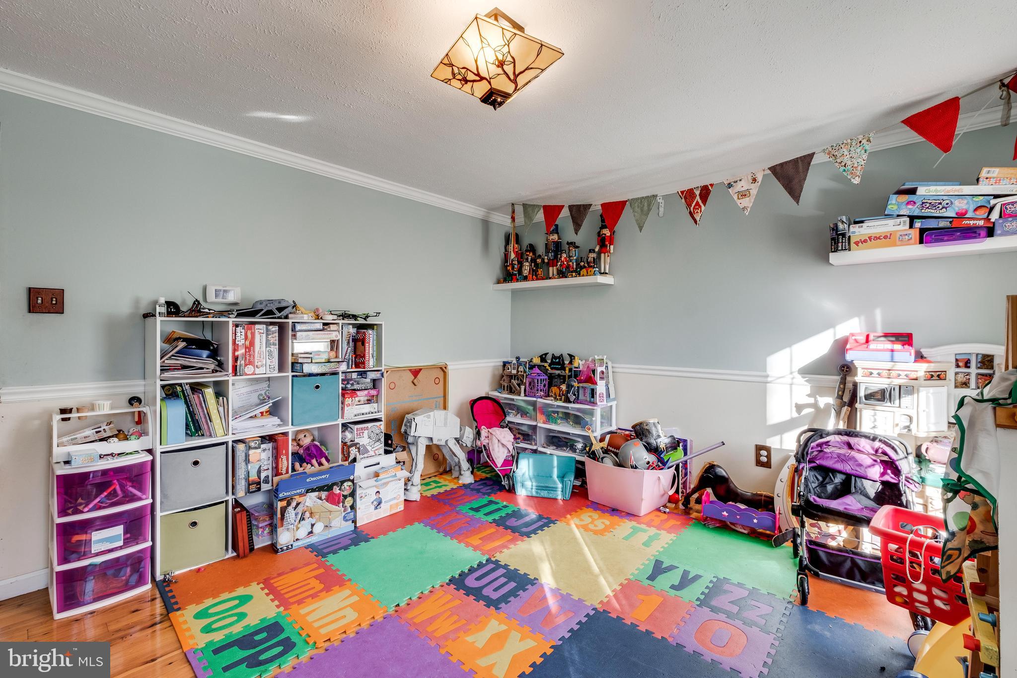 572 Fairview Road Medford, NJ 08055 - Photo 19 of 48 a kids room with toys and a book shelf