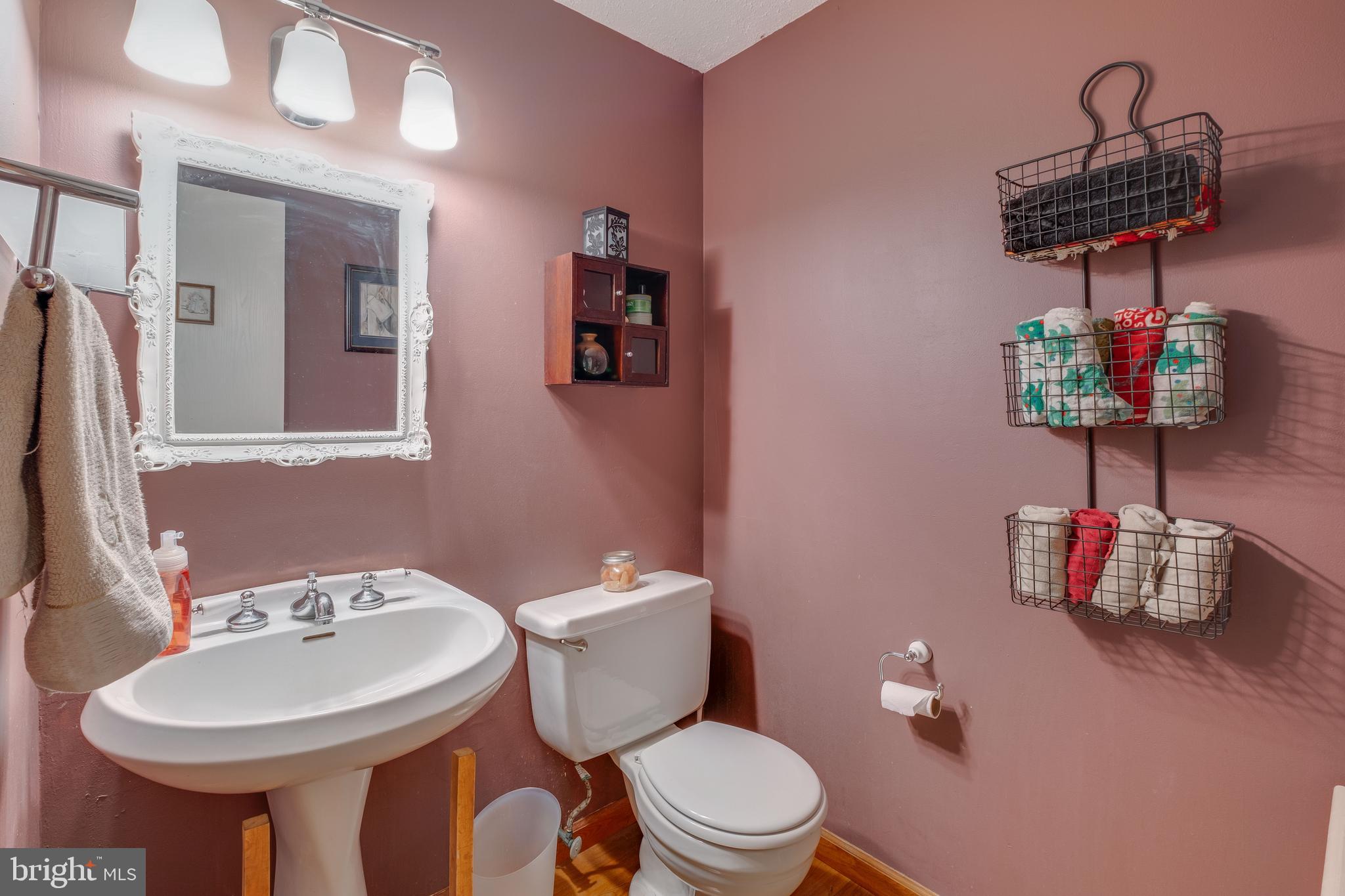 572 Fairview Road Medford, NJ 08055 - Photo 20 of 48 a bathroom with a toilet sink and mirror