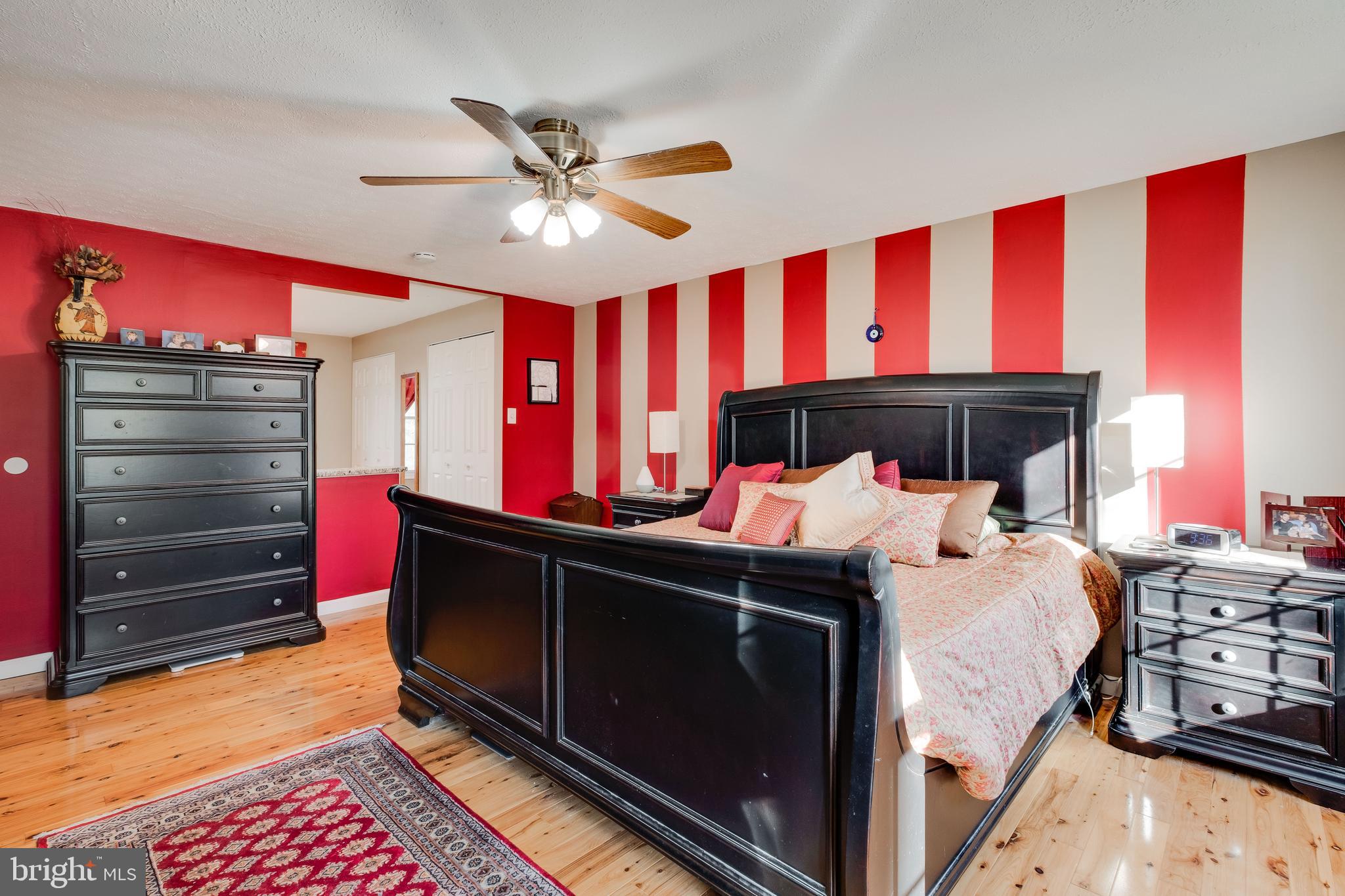 572 Fairview Road Medford, NJ 08055 - Photo 22 of 48 a bed room with a bed and a window