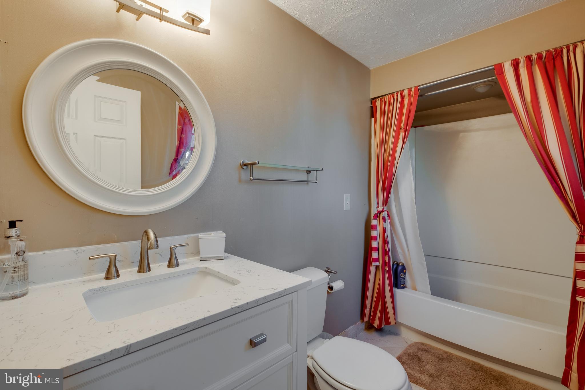 572 Fairview Road Medford, NJ 08055 - Photo 26 of 48 a bathroom with a sink and a mirror