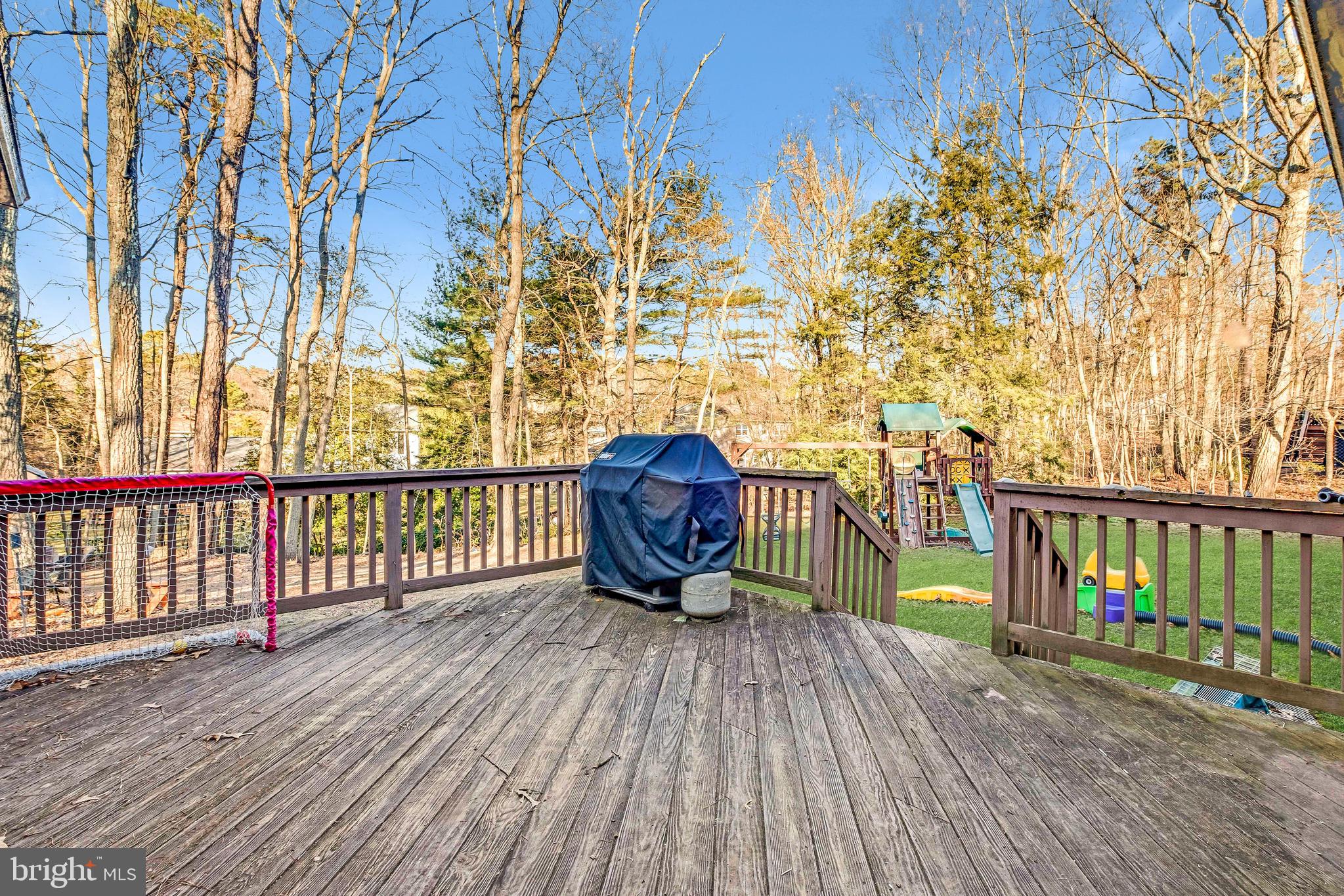572 Fairview Road Medford, NJ 08055 - Photo 39 of 48 a sitting area with swimming pool in the backyard