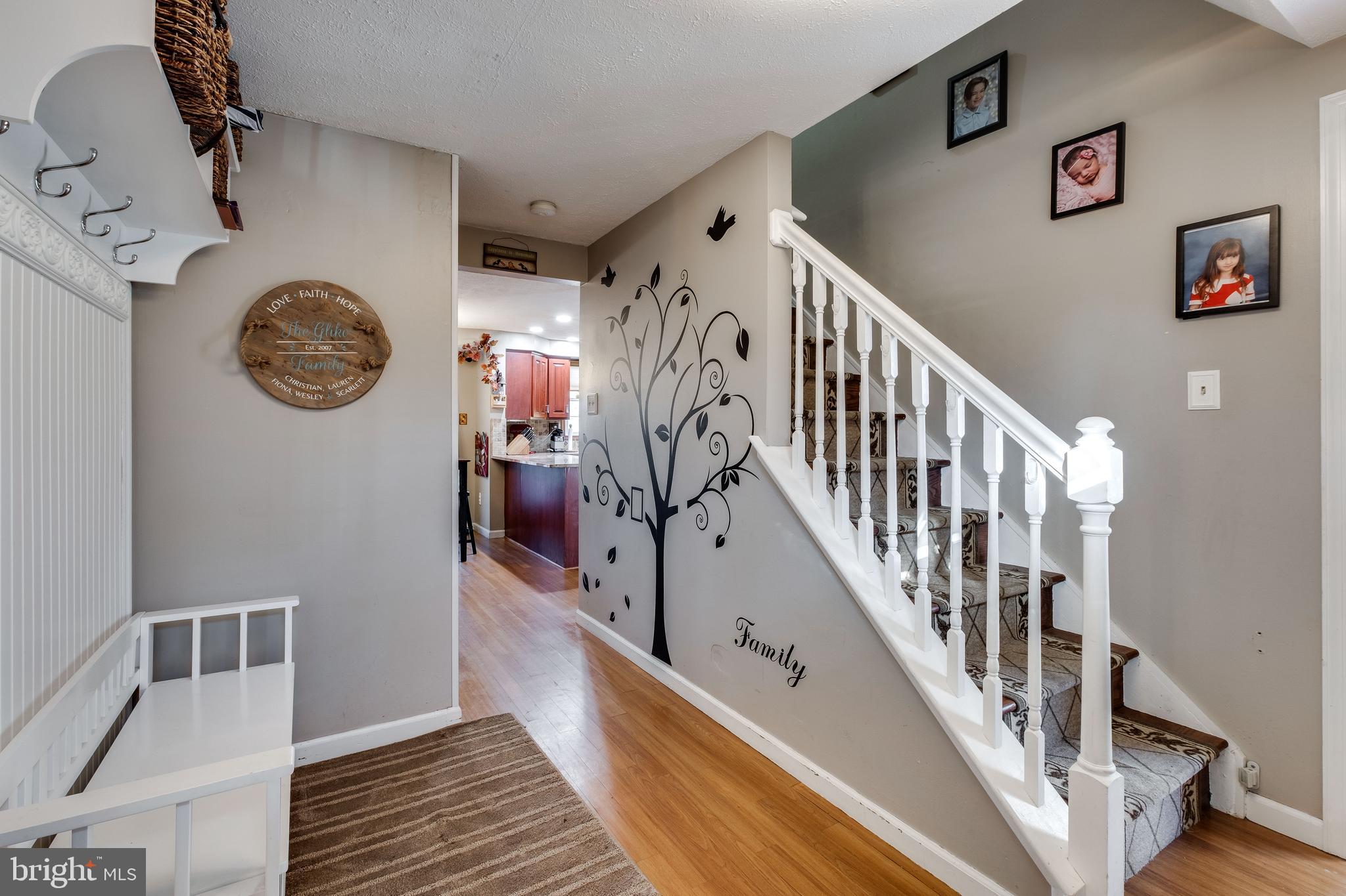 572 Fairview Road Medford, NJ 08055 - Photo 6 of 48 a view of a hallway with wooden floor and windows