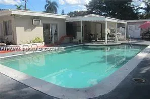 a view of a house with a swimming pool