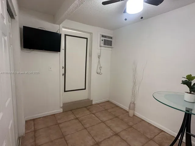 a view of a livingroom with wooden floor