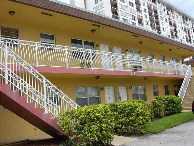 a balcony with a stove and a bench