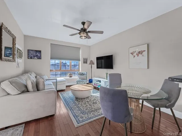 a kitchen with granite countertop a refrigerator stove and sink
