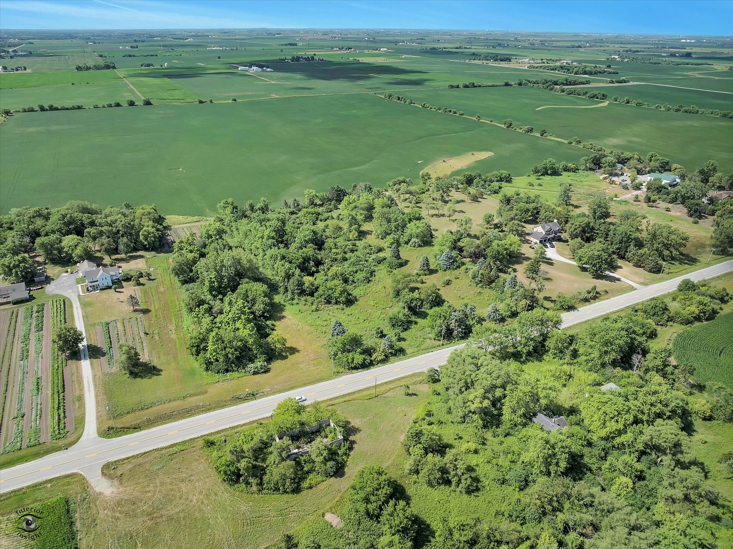 0 West Indiana Avenue Beecher, IL 60401 - Photo 11 of 13 a view of a lush green field with lots of trees