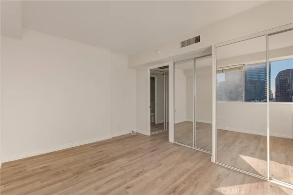 a view of an empty walk in closet