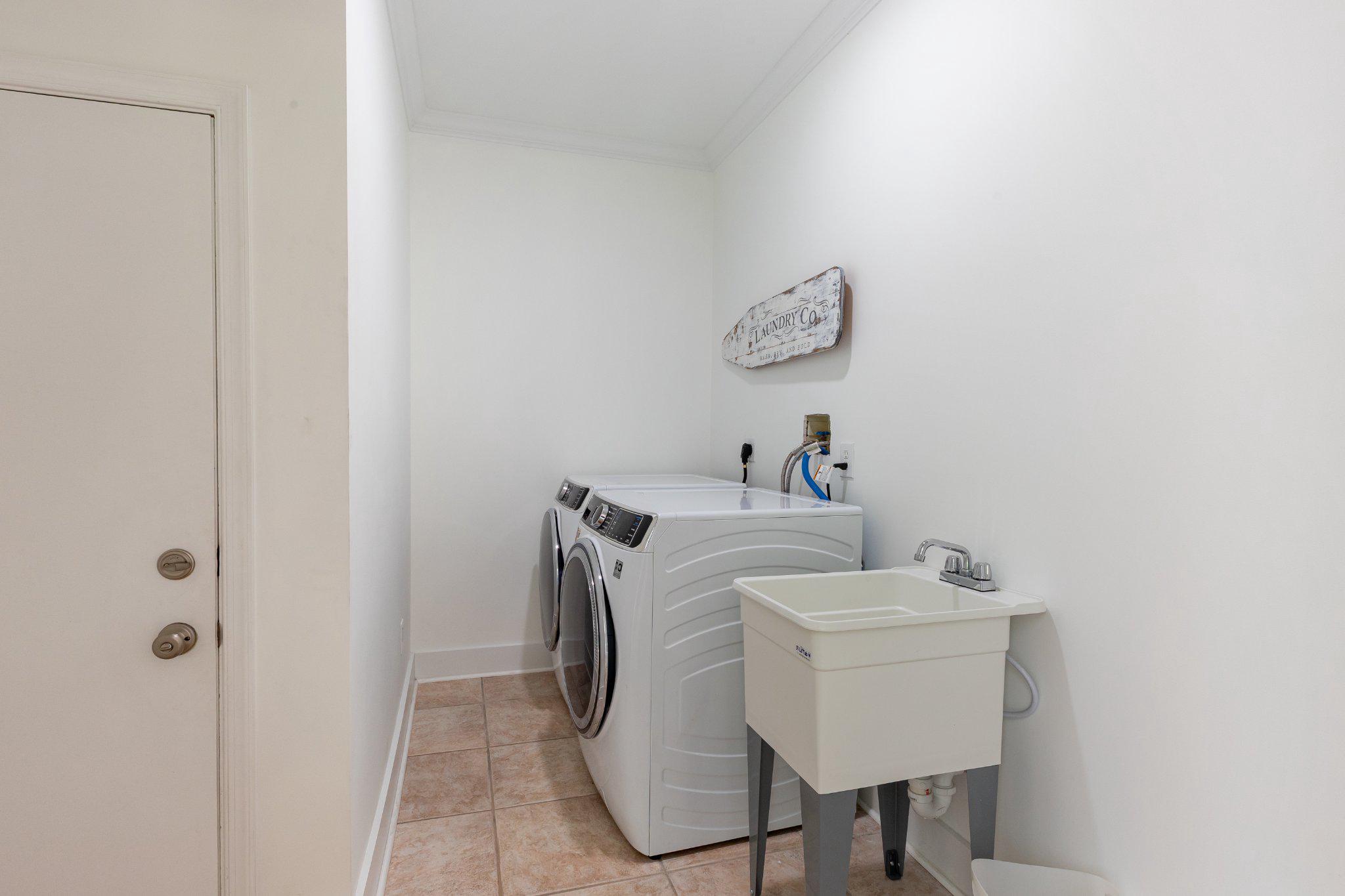 7009 Persimmon Tree Road Bethesda, MD 20817 - Photo 46 of 63 Main Level - Laundry Room - New Washer and Dryer