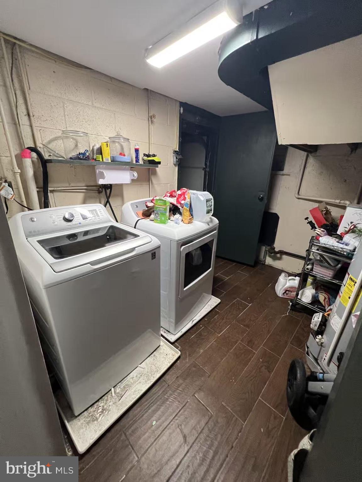12712 Elnora Road Philadelphia, PA 19154 - Photo 15 of 16 a utility room with dryer washer and a view of living room