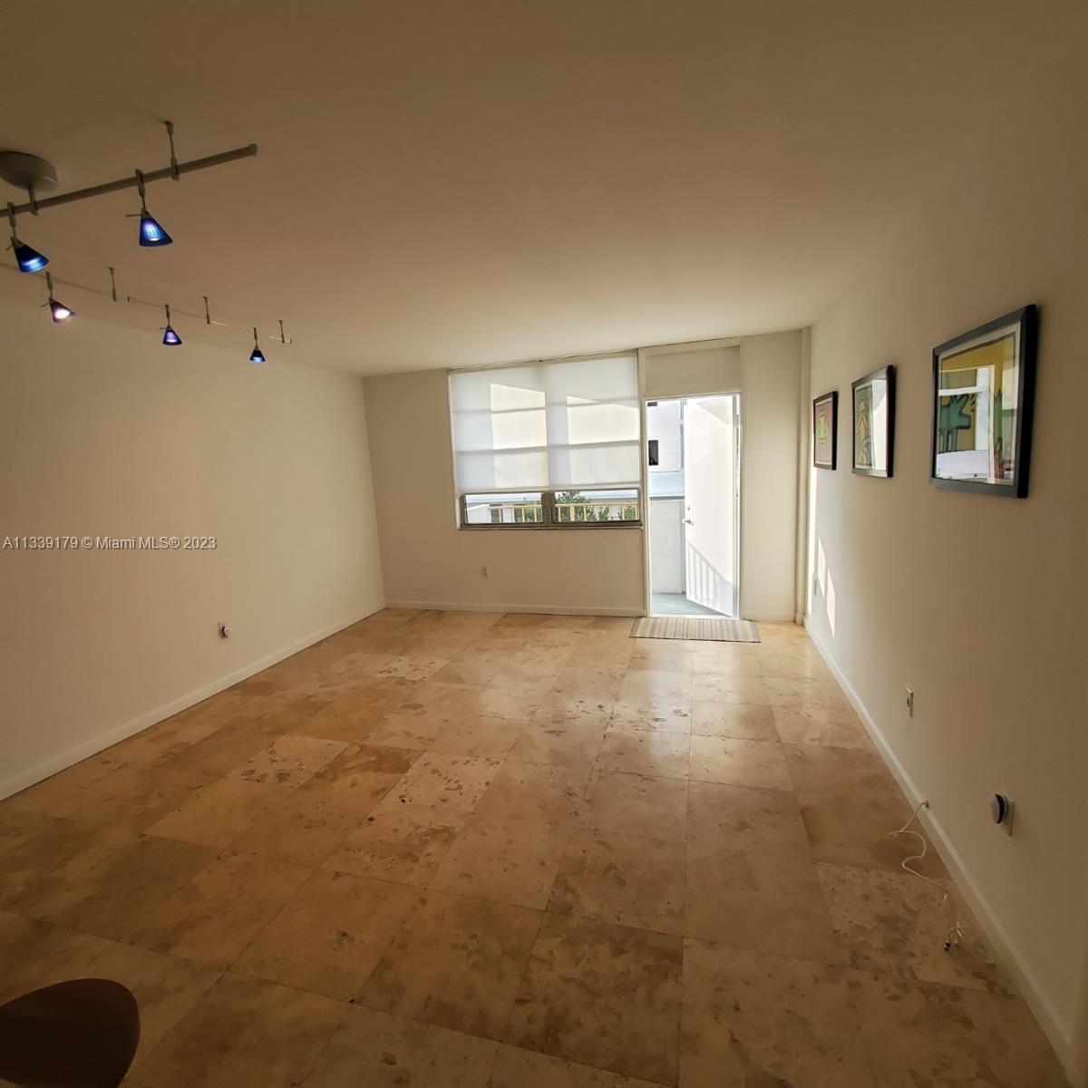 245 18th Street, Unit 403 Miami Beach, FL 33139 - Photo 12 of 30 a view of a room with window and cabinet
